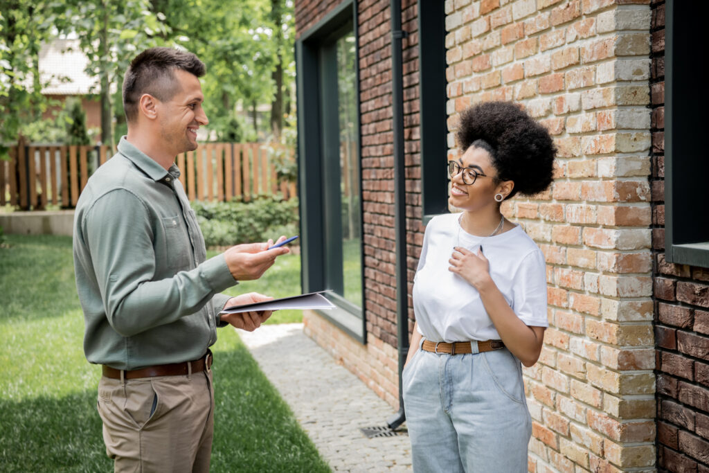 Ambitious sales professional speaking with a homeowner
