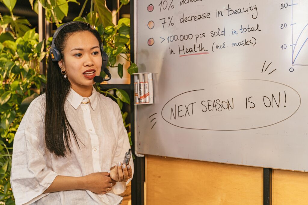 Marketing professional leading a brand awareness campaign during a customer outreach event